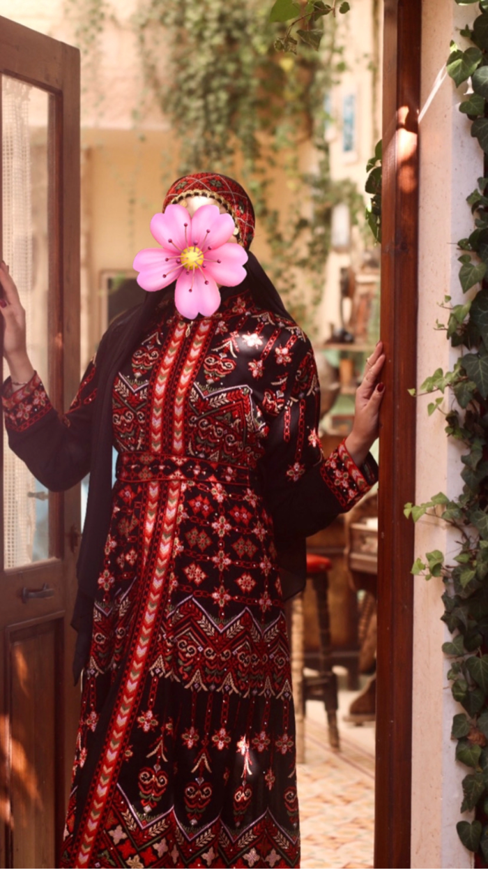 Red embroidered thobe